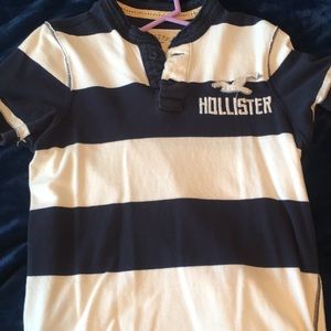 Navy and white striped polo shirt